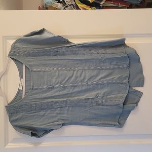 Blue button back shirt